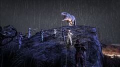 Players fighting a Giganotosaurus