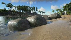Round rocks on and around the river shore line with good metal yields